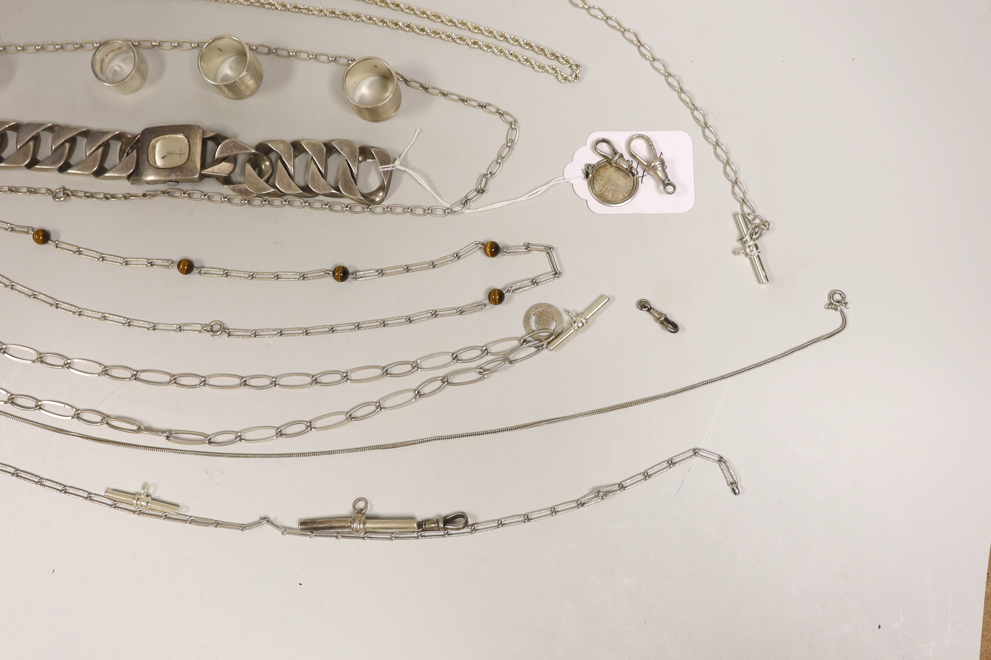 Sundry silver and white metal jewellery etc. including T-bars, necklaces, rings and a large curb link bracelet watch.